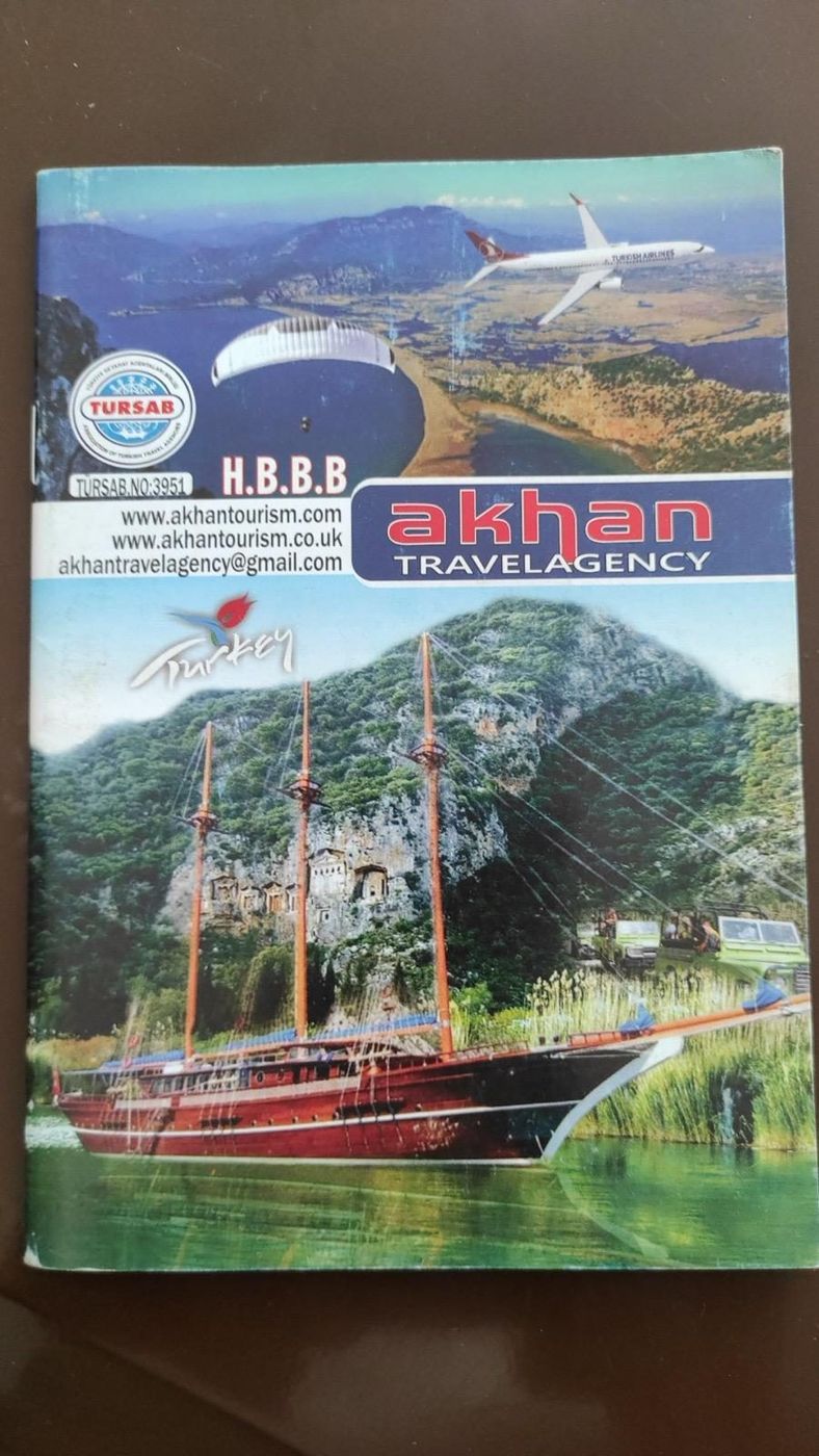 The printed Akhan Travel Agency brochure, with its TÜRSAB badge