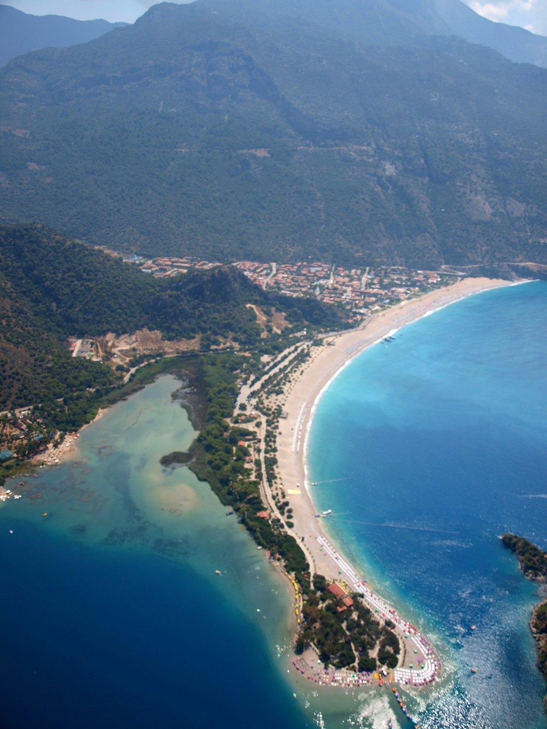 Tandem paraglider over the Ölüdeniz Blue Lagoon